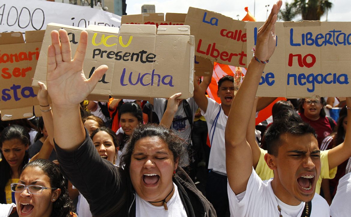 Opposition supporters demonstrate against Venezuela’s President Nicolas Maduro’s government in Caracas